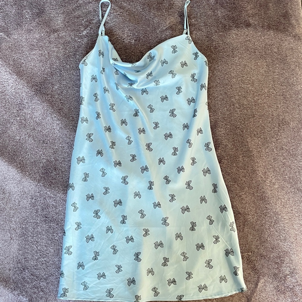 Light Blue Slip Dress with Bow Pattern